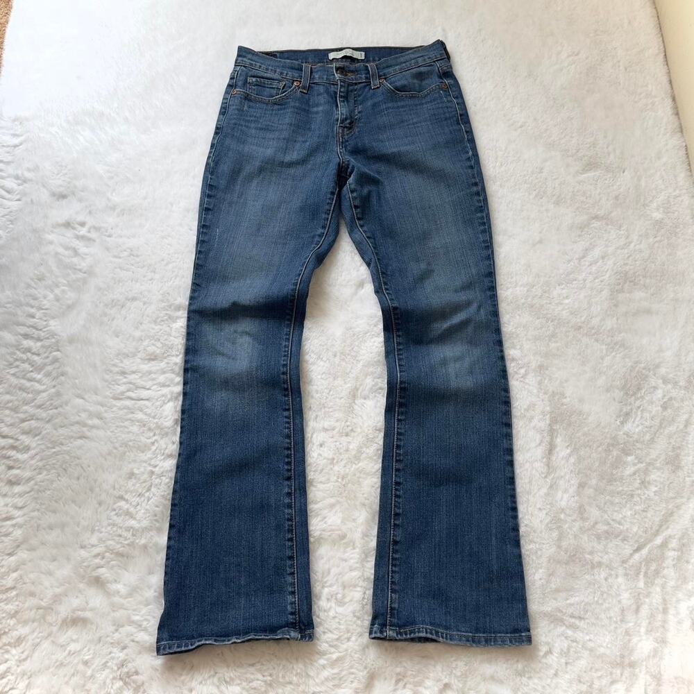 Women’s Levi’s 515 Bootcut Jeans Size 4 Medium Length Blue Flap Pockets Preppy